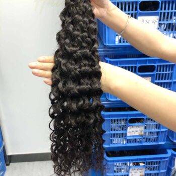 Curly human hair peruvian hair extensions
